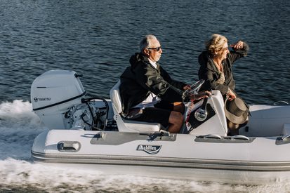 Achilles inflatable boat powered by a Tohatsu outboard motor