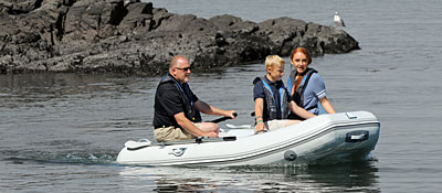 Family in inflatable boat